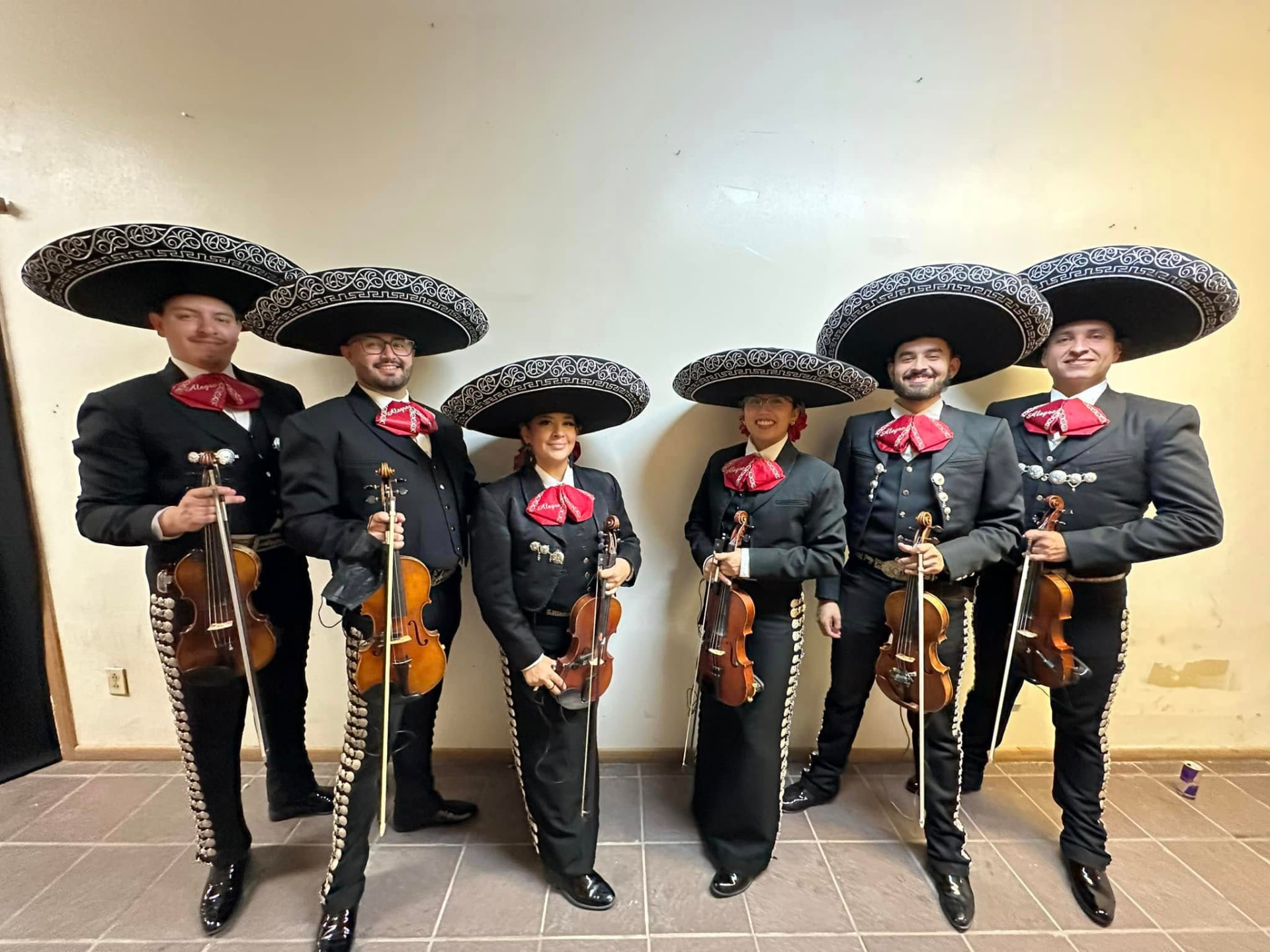 Mariachi Alegre violin section in sombreros